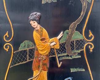 DETAIL. This is a small cabinet designed in the Chinoiserie style. It's about 30" wide, 45" tall, and 10" deep.