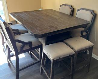 Wood pub style table with 4 chairs and 4 stools