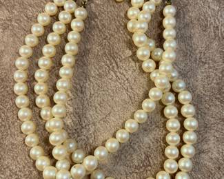 Triple strand of pearls