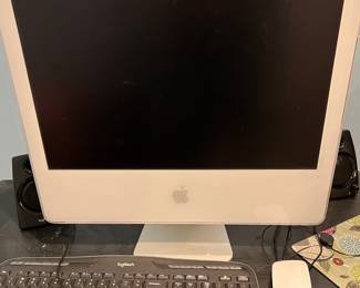 iMac with mouse and keyboard
