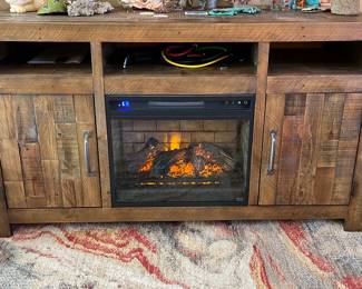 Signature by Ashley Furniture entertainment center with built-in electric fireplace