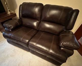 Leather reclyning love seat (very good condition)