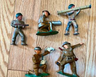 Cast iron army men by BARCLAY MANOIL TOY 