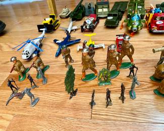 Cast iron soldiers and military vehicles