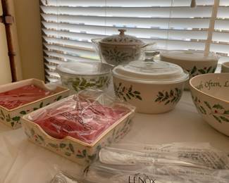the boxes for all of the Lenox holiday china are underneath the display tables