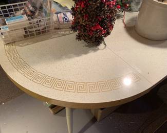 this is the formica table that goes with the 4 mcm chairs.  It took us a while to clear the table.  