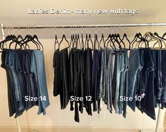 Ladies denim jeans. most with tags. Blue and black. Size 10, 12, 14- different styles and cut.