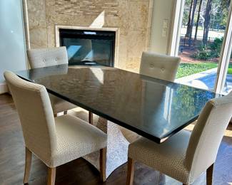 a Made Goods Noor table (6’ by 40”), chairs priced separately