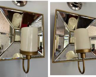pair of mirrored candle sconces