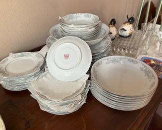 Another set of China on top of buffet that matches previous China cabinet