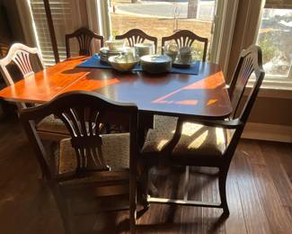 Table & 10 matching Chairs in dining room