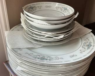 Close up of items in previous china cabinet - China set