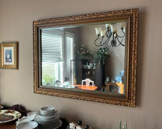 Large mirror over buffet