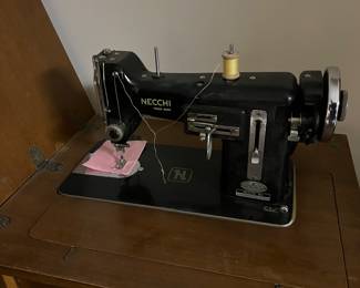 Necchi sewing machine with cabinet