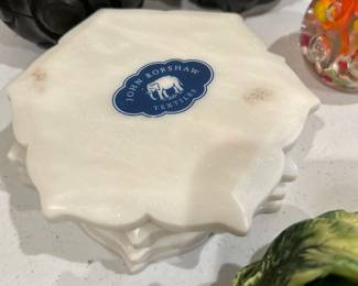 John Robshaw marble coasters These marble coasters are a tribute to the architecture of Mughal, India. Hand-carved. Comes as a set of 4.