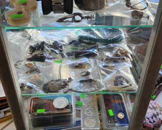 silver jewelry and coins