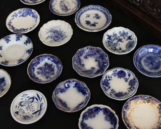 Flow blue butter pats 