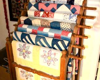 Various multi-colored quilts