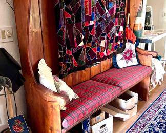 Wooden high back bench and Victorian crazy quilt 
