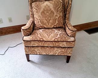 Wingback chair and cushion.
