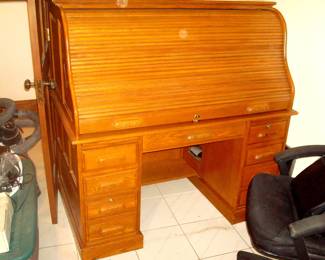 Large roll top desk.