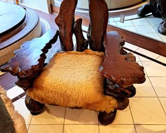 chair shown with back upholstered cushion removed.