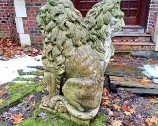 Pair cement lions, 48 inches high, weigh between 400 and 500 lbs. each.