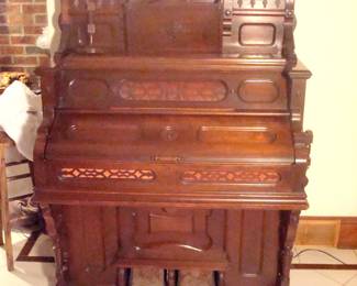 Victorian 1890's walnut ornate pump organ.