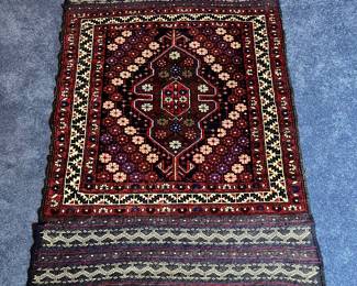 One of several vintage handmade rugs