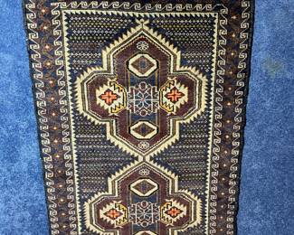 One of several vintage handmade rugs