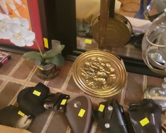 Several leather holsters and ammo