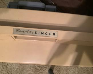 Singer in case