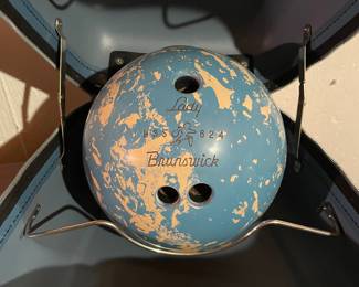 Woman’s bowling ball with case