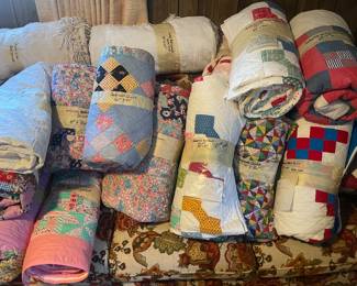 Many handmade quilts 