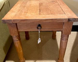 $50. Rustic wood side table with one drawer. Some wear noted. 
