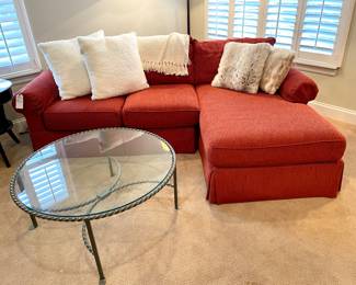 SOLD Two piece sectional by CR Laine . Right arm with deep red color. Love seat portion: 62x37x30. Chaise section: 39x64x30. $350. Coffee table. 38” D x 17”H