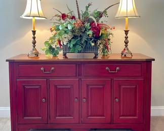 $450. Very versatile, red distressed media cabinet by Sherrill 63L x 18W x 35H. Minor marks noted on top. 