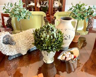 $200 Designer quality, Lamb figurine from Three French Hens 19L x 10W x 12H. SOLD—distressed shabby chic Bordeaux wine jug 9L 15H. SOLD—Greenery in resin planter 9L x 16H