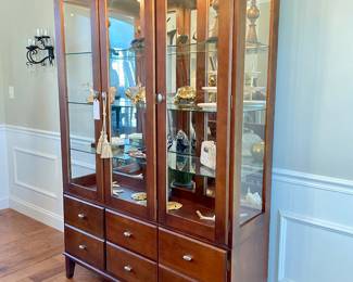 SOLD Versatile and well scaled,  glass front, lighted cabinet by Ethan Allen 52L x 16W x 78H. 