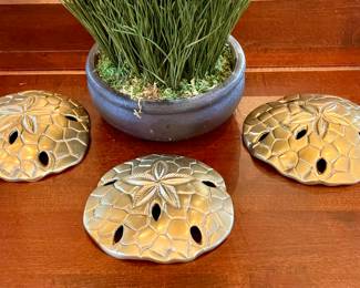 SOLD each, gold sand dollar decor, 5 inches diam. 