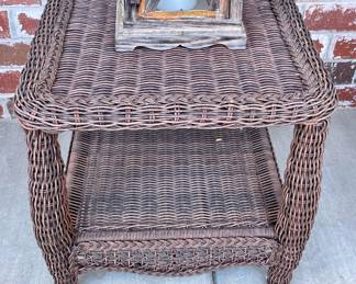 $100. Outdoor wicker side table. 20” width by 22.5 inch height.