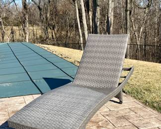 SOLD/each. Outdoor faux woven wicker chaise lounge chair. Adjustable back, casters for easy moving. 78x25 inch.