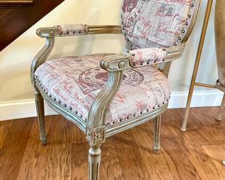 $300. Distressed greige wood chair with nailhead trim by Uttermost Design. Original price tag is $895. 24 inch by 21x37 high. 