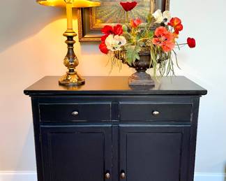 SOLD—Black distressed cabinet, very versatile 42L x 18W x 38H. $200 Black and gold painted lamp by Chelsea House 16W x 35H. SOLD - Poppy floral arrangement with black urn 23L x 22H. 
