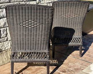 $70. Outdoor faux wicker Hampton Bay chair. 2 available. 20x20x39 inches.