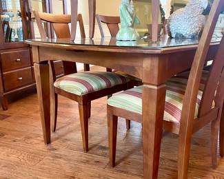 $2800 for complete set.  Dining table and chairs by Ethan Allen.  Table includes two leaves, 8 chairs, and 2 armchairs. Table: 68 inches long with 2 leaves.  Leaves are 18 “ each. Chairs are 24x18x38.