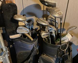 assorted golf clubs