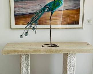 Tall peacock metal art sculpture  on stone entry table