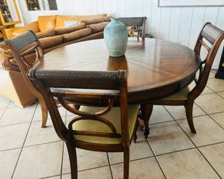 Nice round dining table and four chairs - would also make a great game table