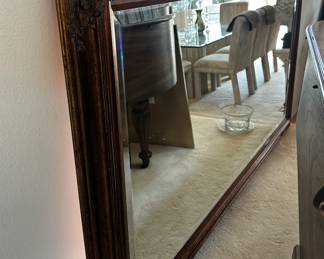 Very large framed beveled mirror